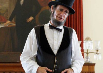 Caucasian man in Abraham Lincoln costume