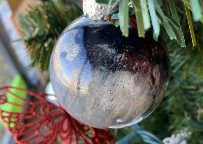 closeup of marbled ornament on Christmas tree