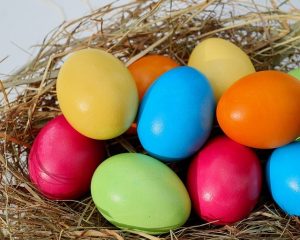 closeup of multicolored Easter eggs in a nest