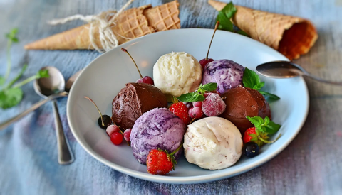 bowl of ice cream and berries